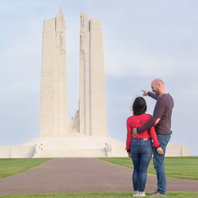 Couple standing in front of the Canadian WW1 Memorial at Vimy Ridge